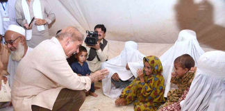 PM in Nowshera to review relief operation; distribute cheques among flood-stricken people