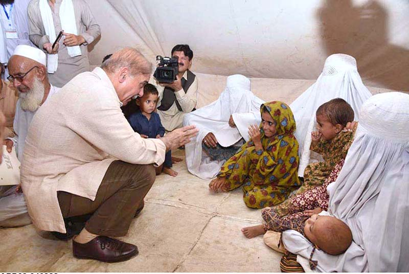 PM in Nowshera to review relief operation; distribute cheques among flood-stricken people