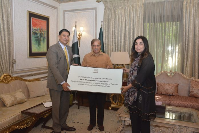 Directors Nestle Pakistan present Rs10 mn cheque to PM for Flood Relief Fund