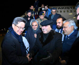 President Asif Ali Zardari being welcomed by the Chinese Finance Minister