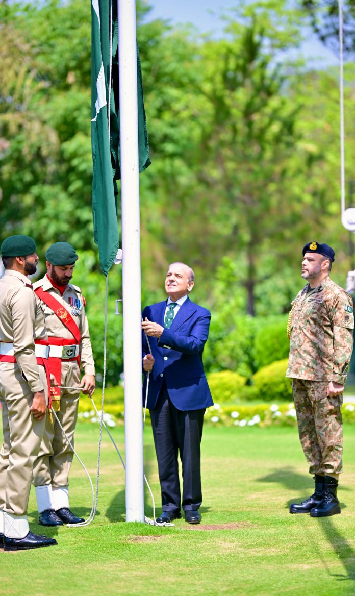 image PM hoists flag to mark Youm-e-Tashakkur (Thanksgiving Day)