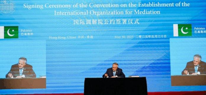 DPM signs covention establishing International Organization for Mediation in Hong Kong